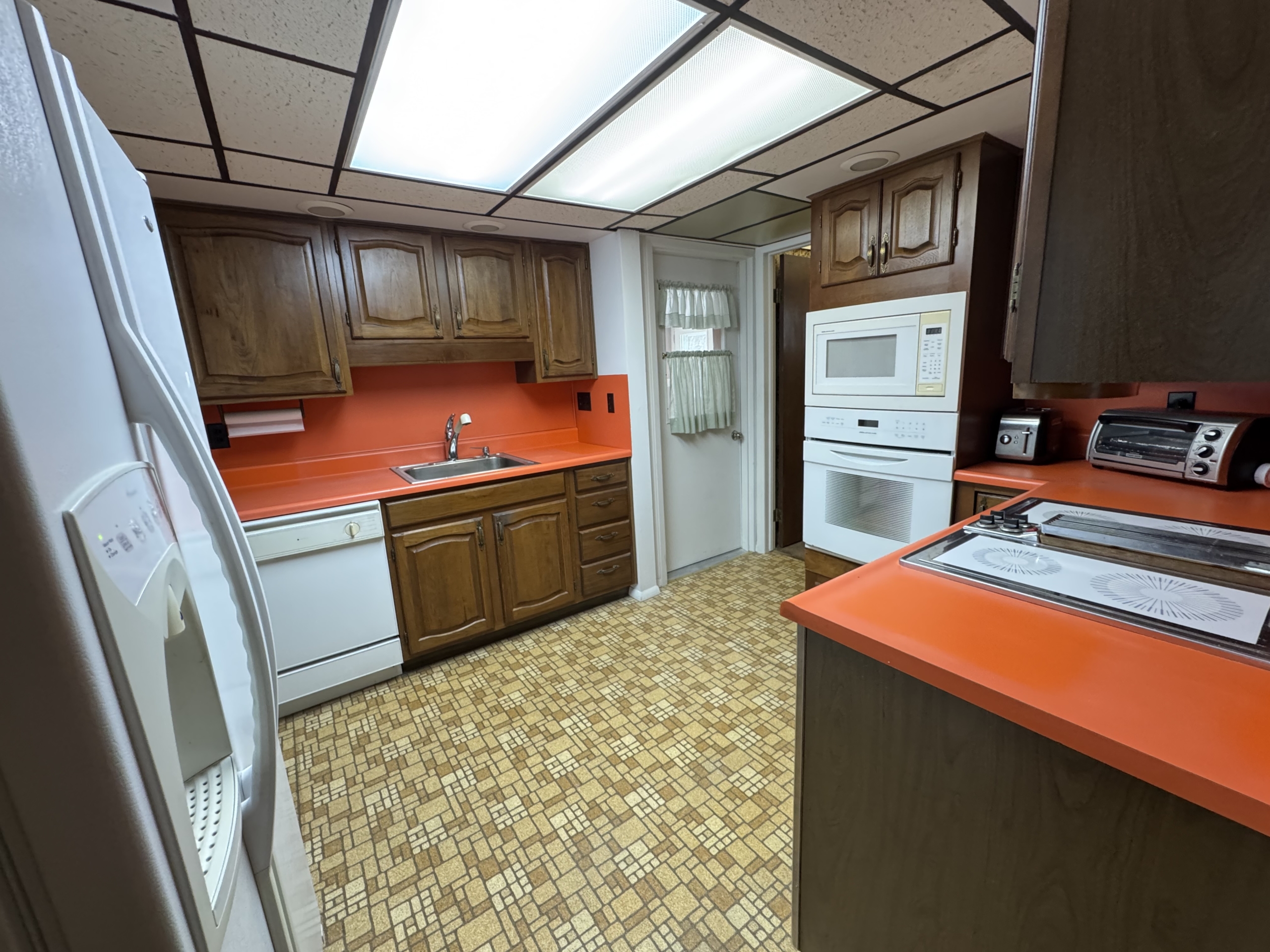 Kitchen from eatin to back door